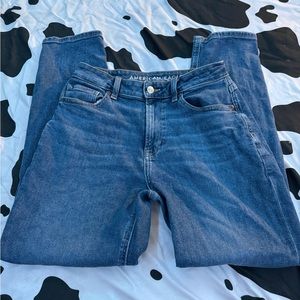 American Eagle mom jeans with tears at the knees